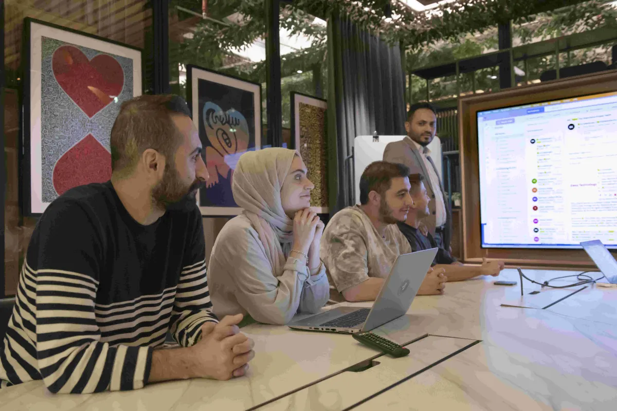 Engineers following a technical presentation
